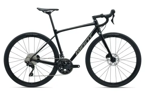 Zwarte Giant endurance racefiets met schijfremmen en brede banden, ideaal voor lange, comfortabele ritten.