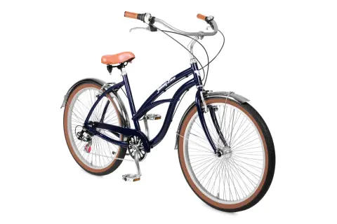 Donkerblauwe beach cruiser fiets met bruin zadel en handvatten, klaar voor een ritje langs de kust.