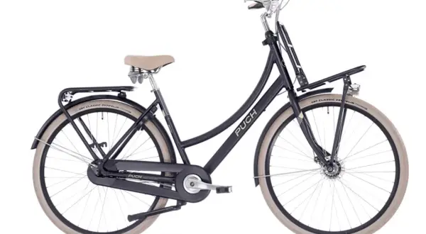 Donkerblauwe Puch omafiets met beige zadel en banden. Een echte omafiets aanbieding voor comfortabel fietsen.
