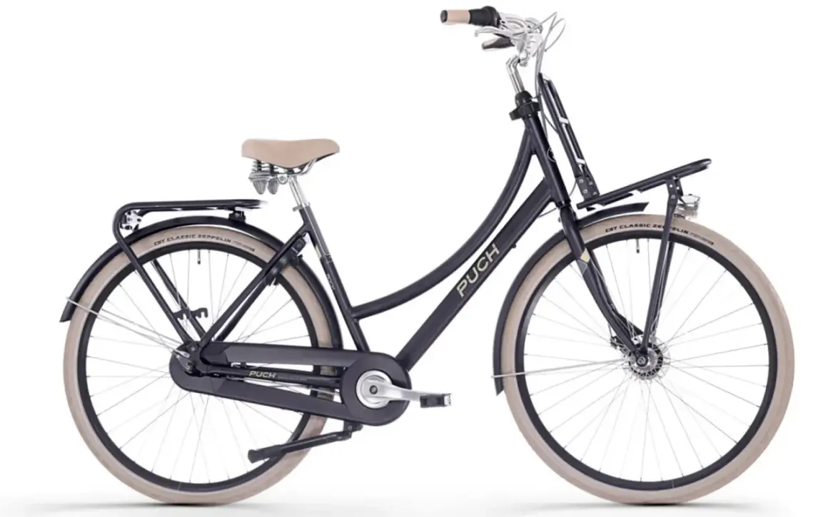 Donkerblauwe Puch omafiets met beige zadel en banden. Een echte omafiets aanbieding voor comfortabel fietsen.
