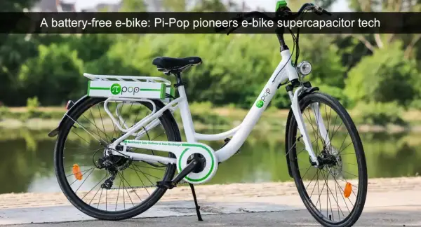 Witte elektrische fiets zonder accu, met Pi-Pop logo. Deze fiets gebruikt supercondensator technologie voor ondersteuning.